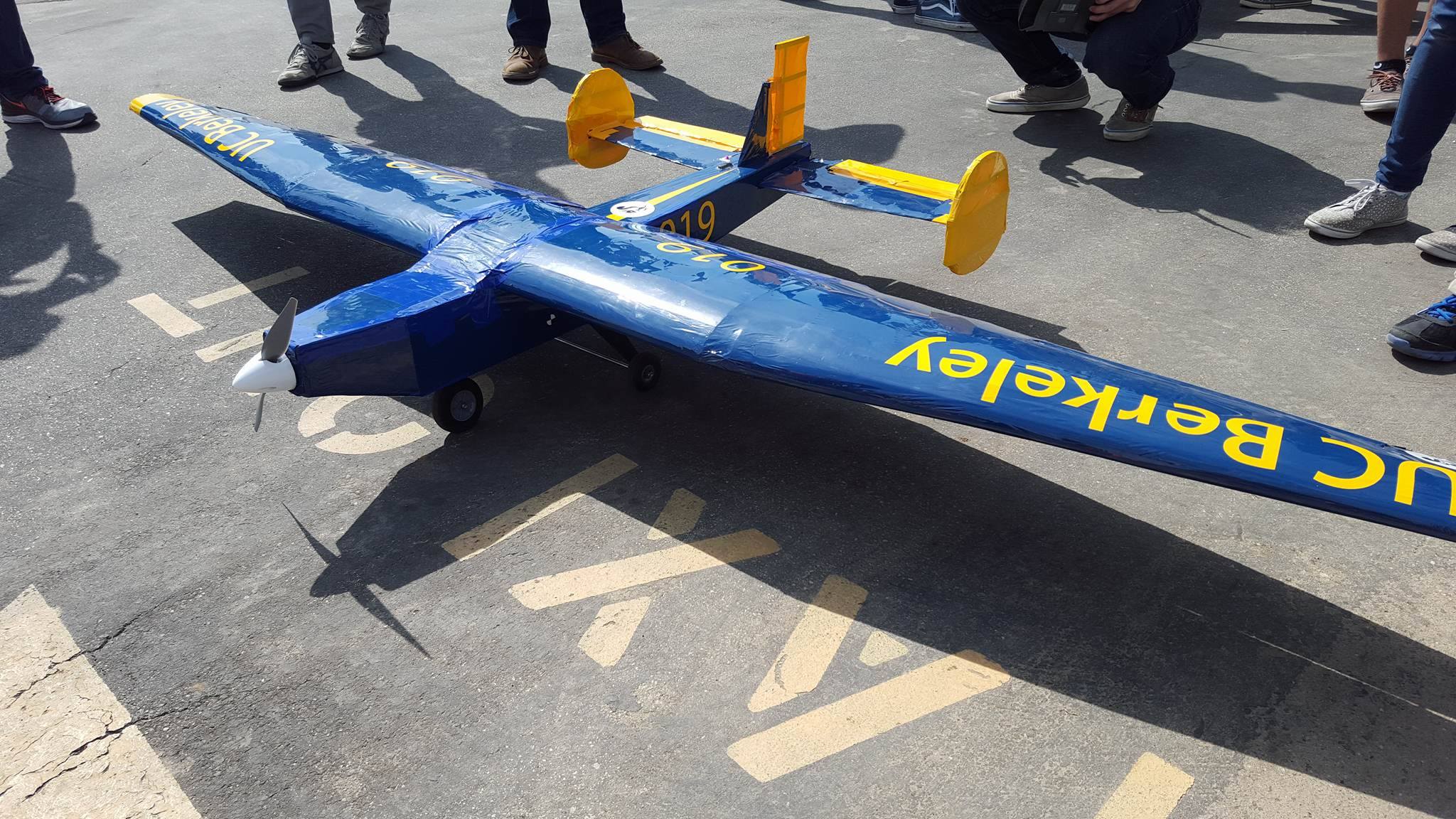 The team's blue and gold high-wing aircraft